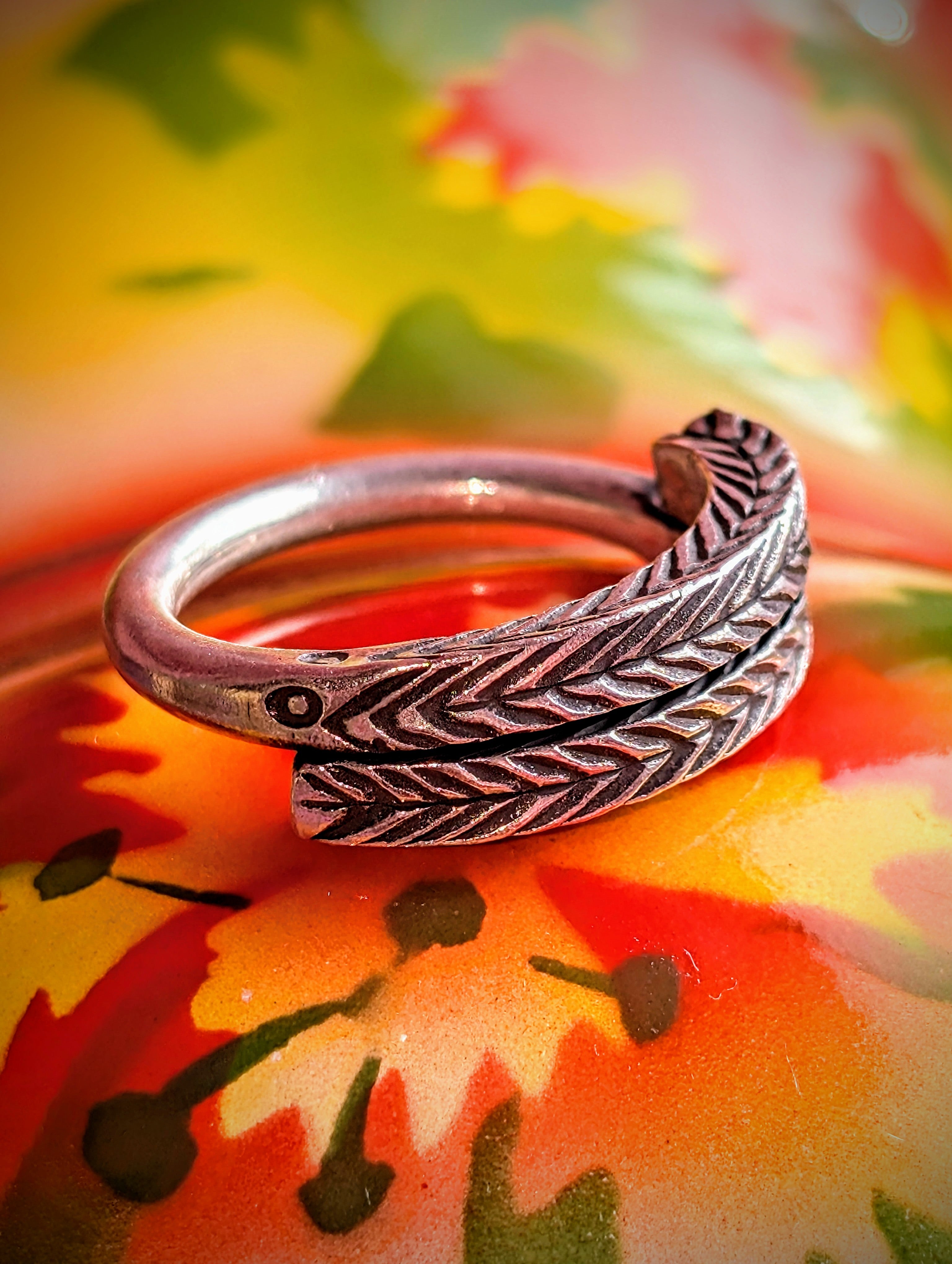 Heavenly heavy incised coiled rings, the chevron pattern resembles woodland ,fairy story fir branches. Available in sizes, but these are such soft silver they can be stretched or coiled in to fit.
The texture in these pieces show the malleable nature of this almost pure silver.
All pieces are hand made and hand finished using traditional methods.
Hill tribe silver has a higher content of silver, at 99.5-99.9% compared with sterling silver at 92.5%. This allows the silver to wear and soften differently from 