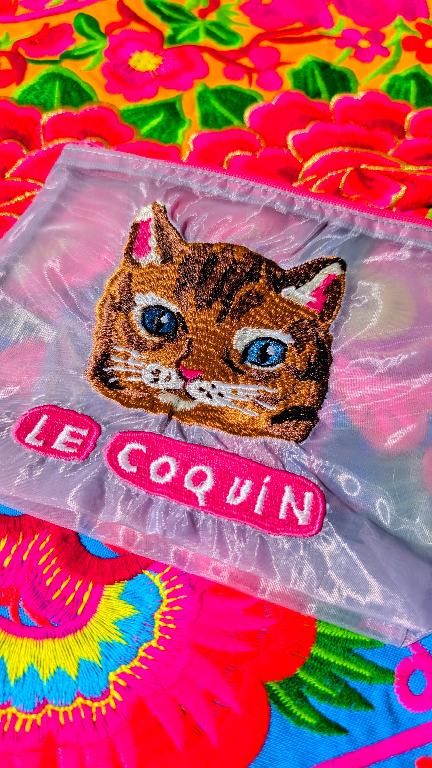 Embroidered puss pouch