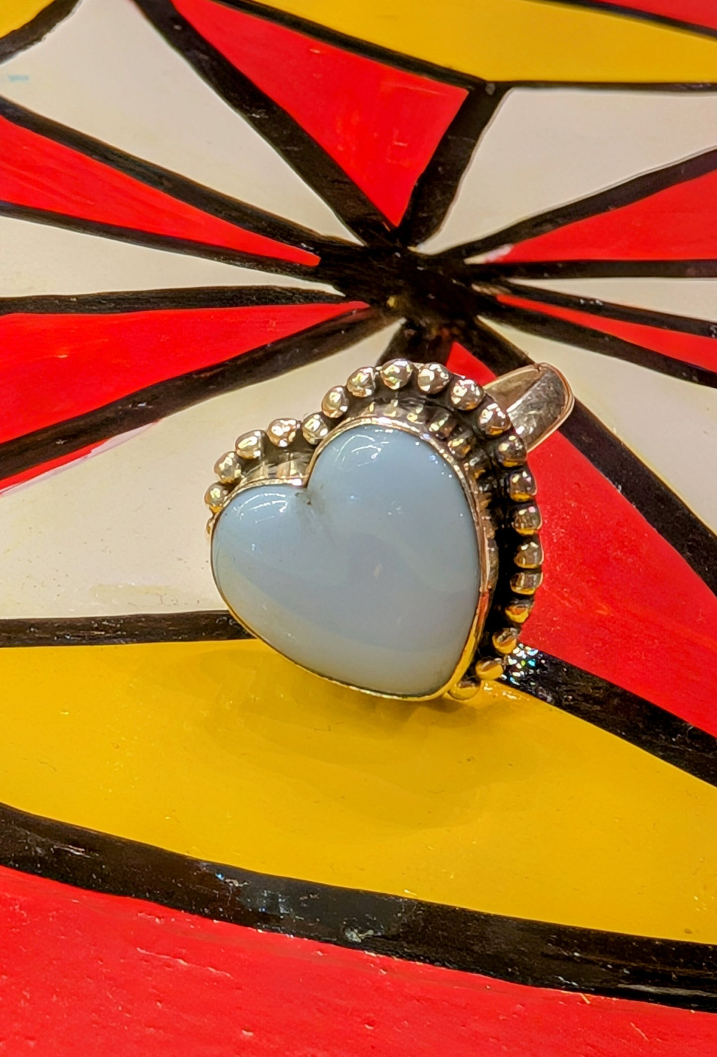 Gorgeous glass sacred heart rings