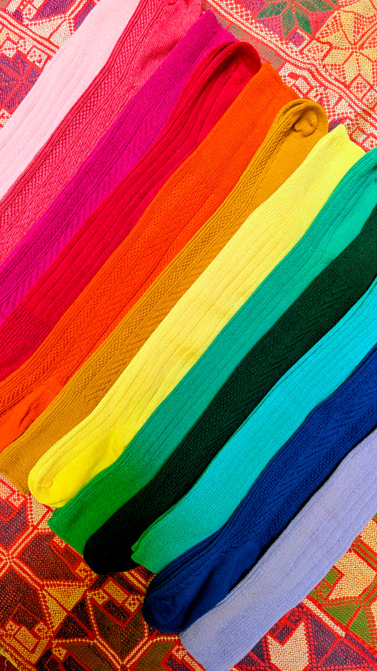 An absolute rainbow of cosy , knee length gorgeous socks, crafted from recycled wool.

We have mixed pastel shades in a soft rib knit with brights in a textured cable knit.

A colour for every outfit!, and great with boots or clogs!

One size fits UK 3.5 to 8.

50% Recycled Wool, 46% Polyester, 3% Acrylic, 1% Elastane. 

Wash with non bio, 30 degrees, shape to dry.
Fonem

 