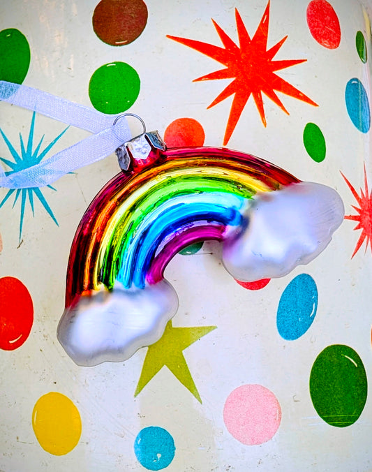 Back to the 1980's  with this rainbow dose of cute cloudy nostalgia!!, hand painted and glittered glass bauble!!

8 x 5 x 2cm

Fragile,handle with care.

 