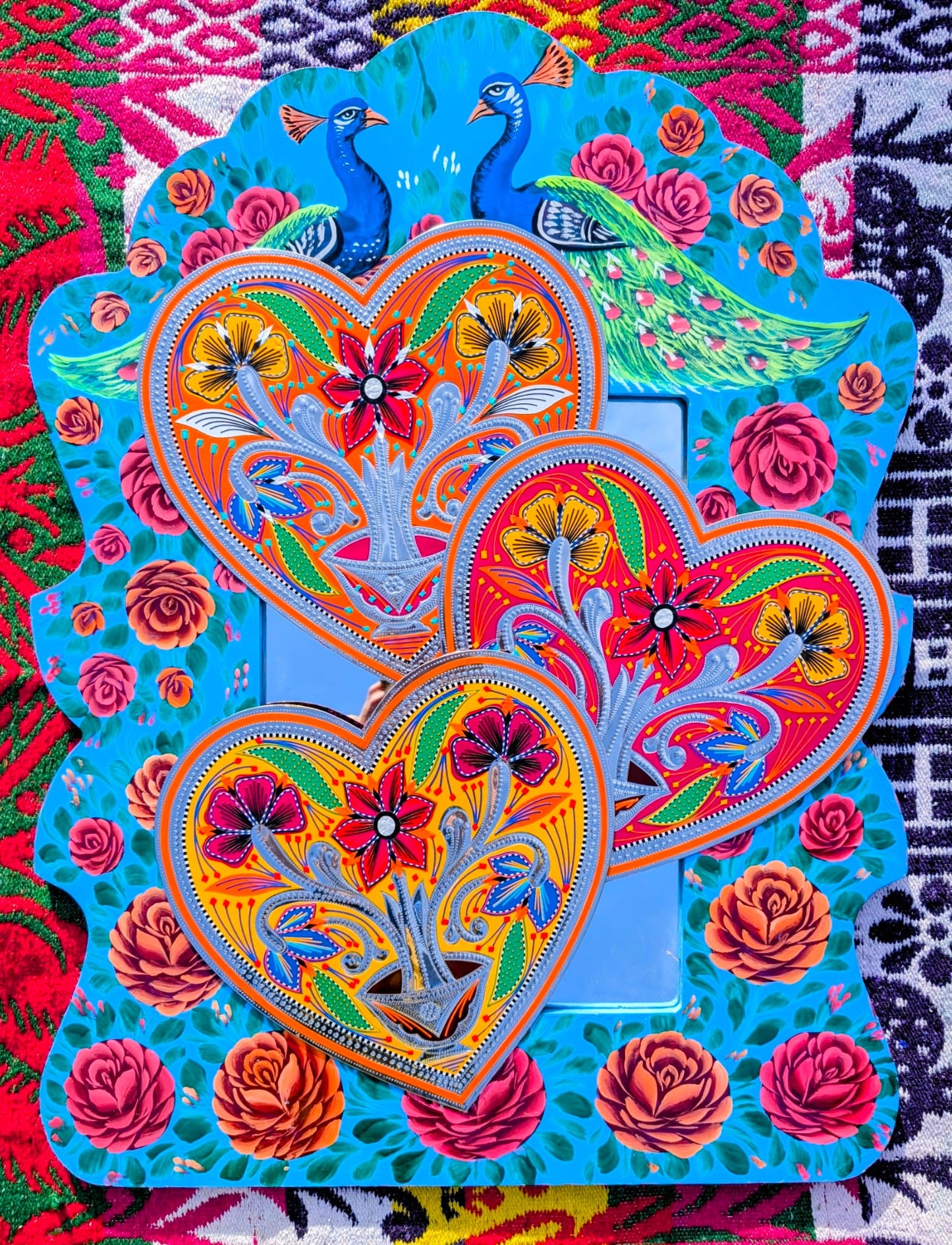 Stunning, sturdy metal love hearts, hand punched and decorated with just gorgeous blooms depicted in razor cut vinyl by the truck artists of Pakistan

These traditionally are used to decorate the trucks outside or in, and are really beautifully made.

30 x 30cm

Chromed steel, vinyl sticker, fabric backed.

 

 
