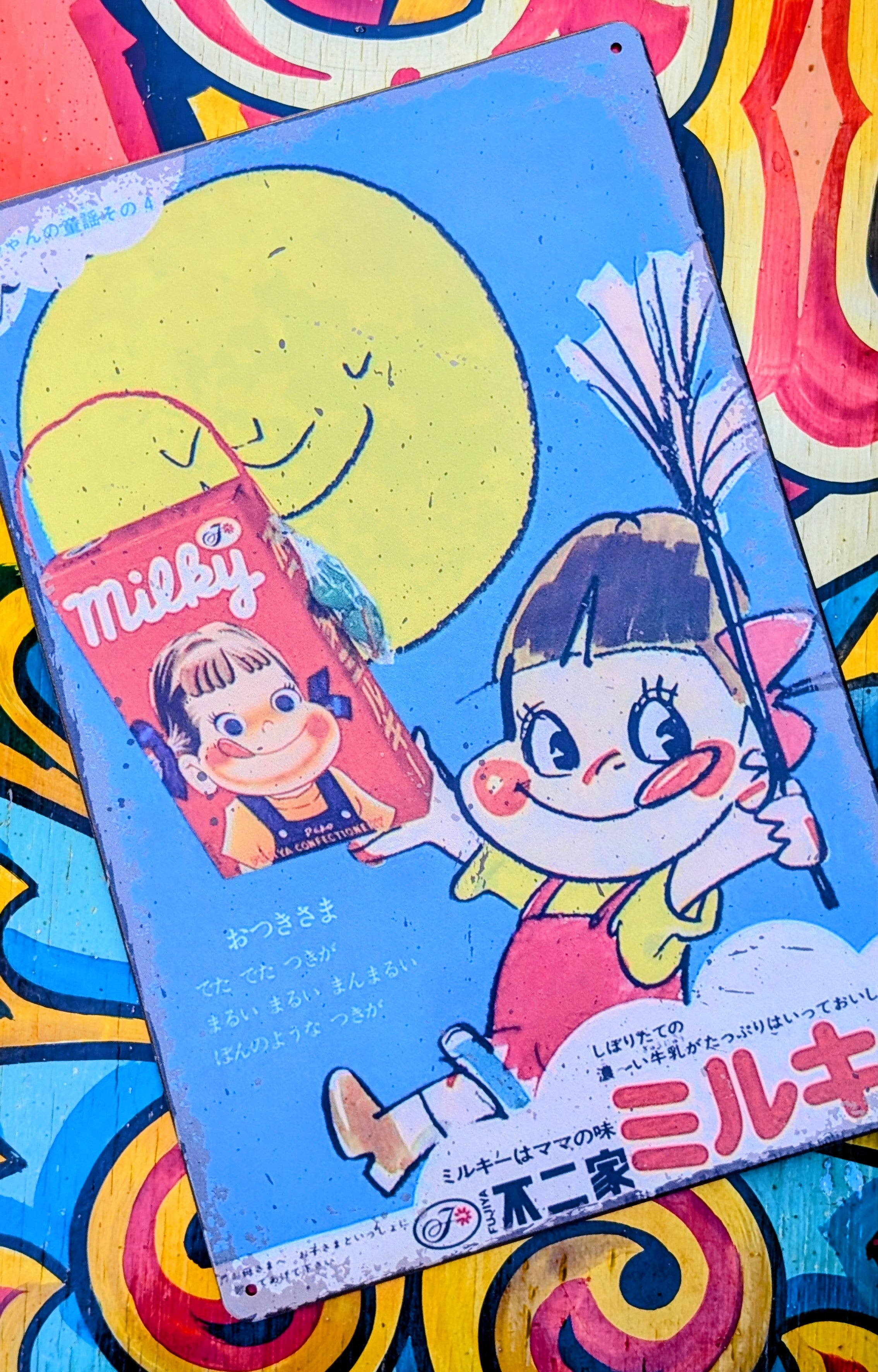 Milky sweets tin signs
