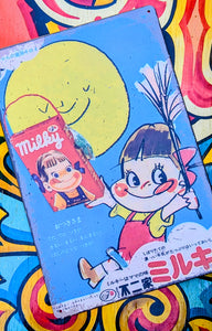 Milky sweets tin signs