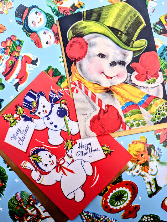We love a vintage kitsch Christmas design and these cheeky snowmen are the best!!

We think these fabulous cards look great framed up too.

Sold as a set of 2

Dimensions 15 x 10.5 cm
Bazartherapy
