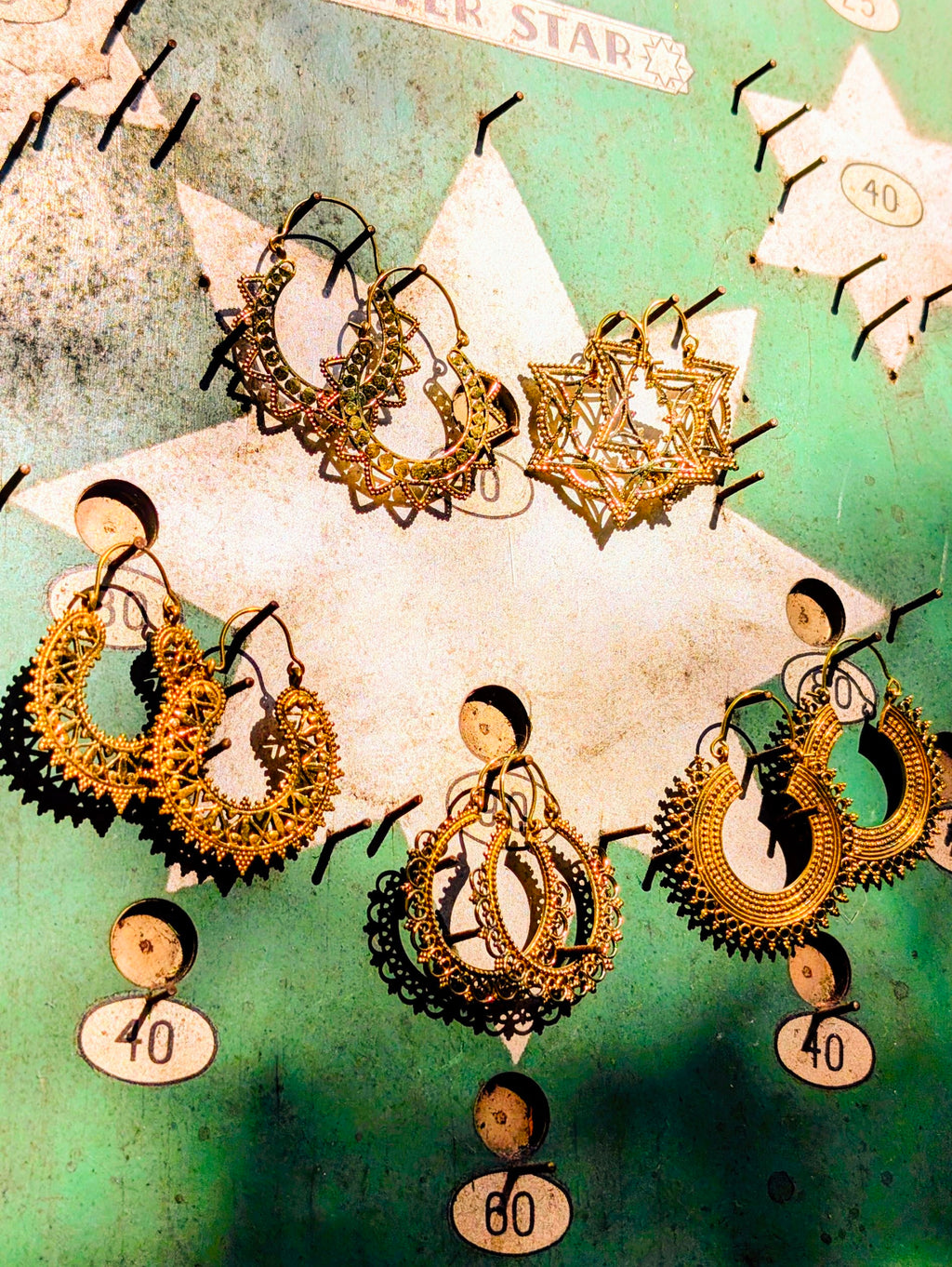 Fancy brassy Indian hoops