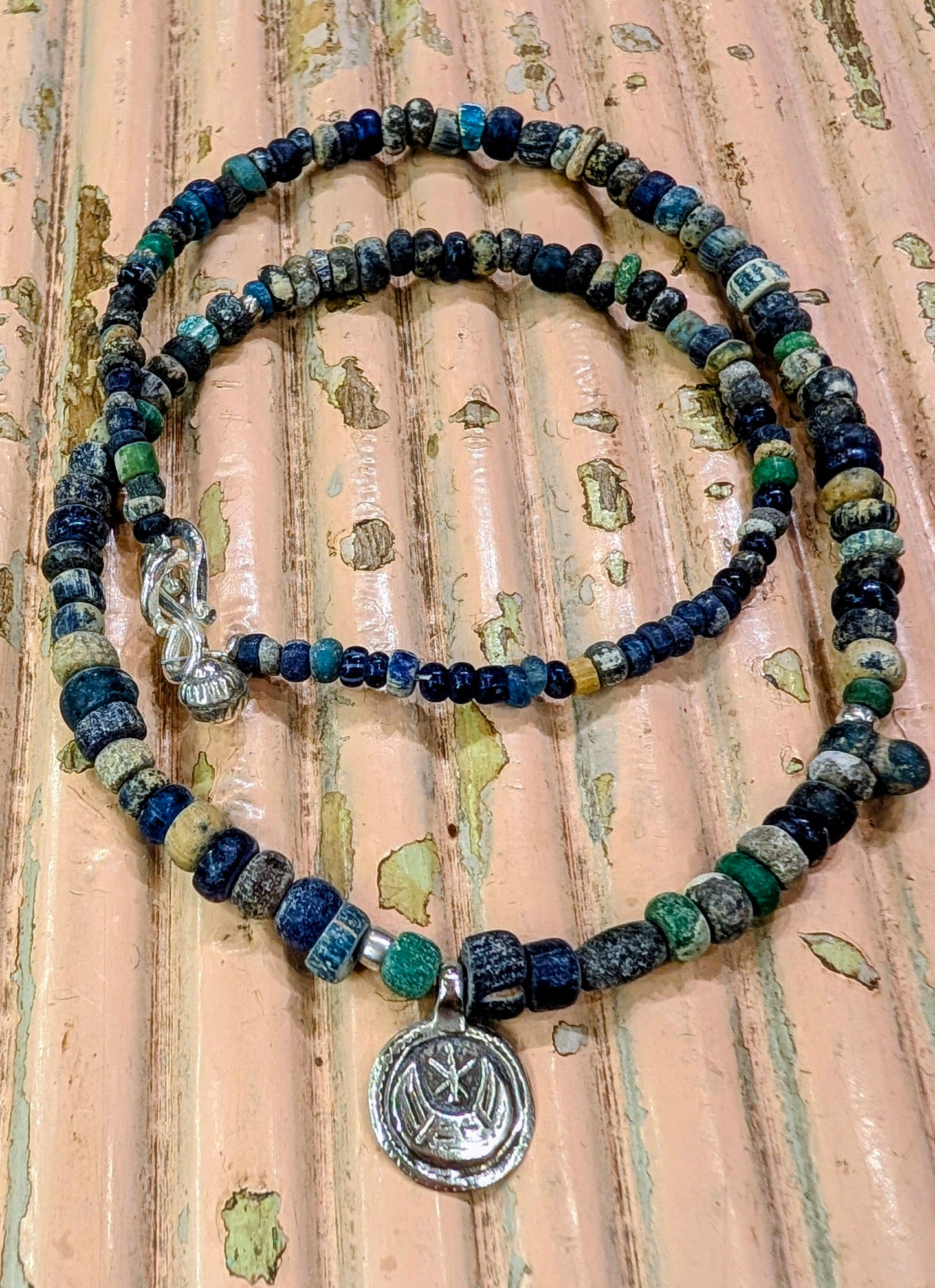 Antique excavated blue glass beads