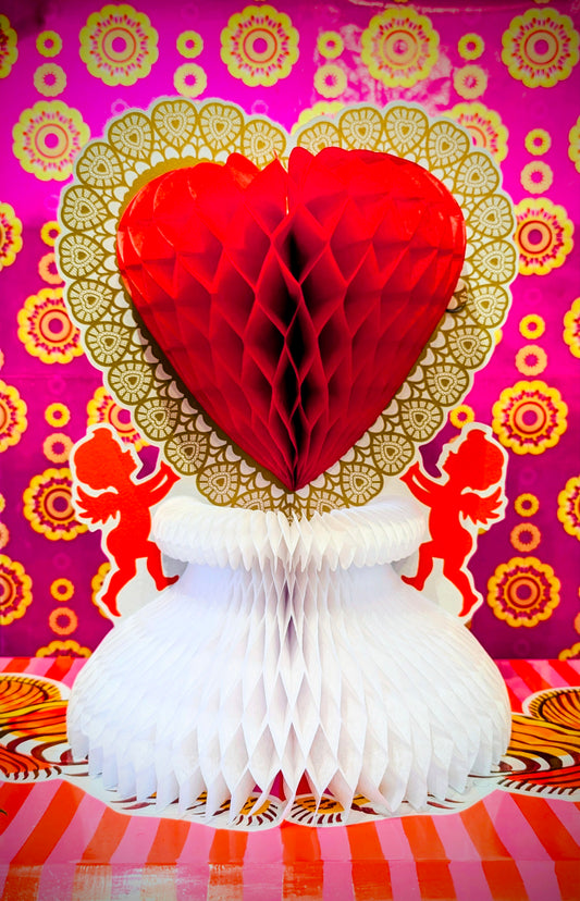 Well....hello KITSCH!

Folding out paper honeycomb centrepiece to decorate your table or shelves in vintage valentine style!

Folds out from flat, printed all round.

30cm high, 22 x 22cm round.

Paper and card.

 