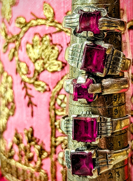 1980s Rajasthanil rings, handmade in and around Pushkar from silver with brightest pink glass stones, worn by men mainly in desert villages.
Numbered from top to bottom.
These pieces vary in wear and tear, so please examine images!

Tribal antique silver traditionally has no hallmarks, but all that we sell have an 80-90% content, as these pieces would have been historically made from old melted down jewellery and coins.  