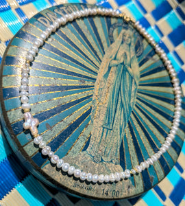 Sacred pearly necklaces