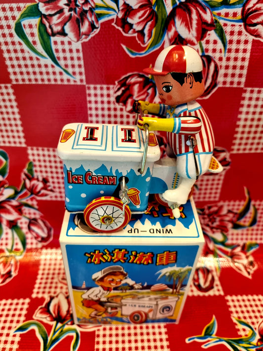 Ice cream man tin toy
