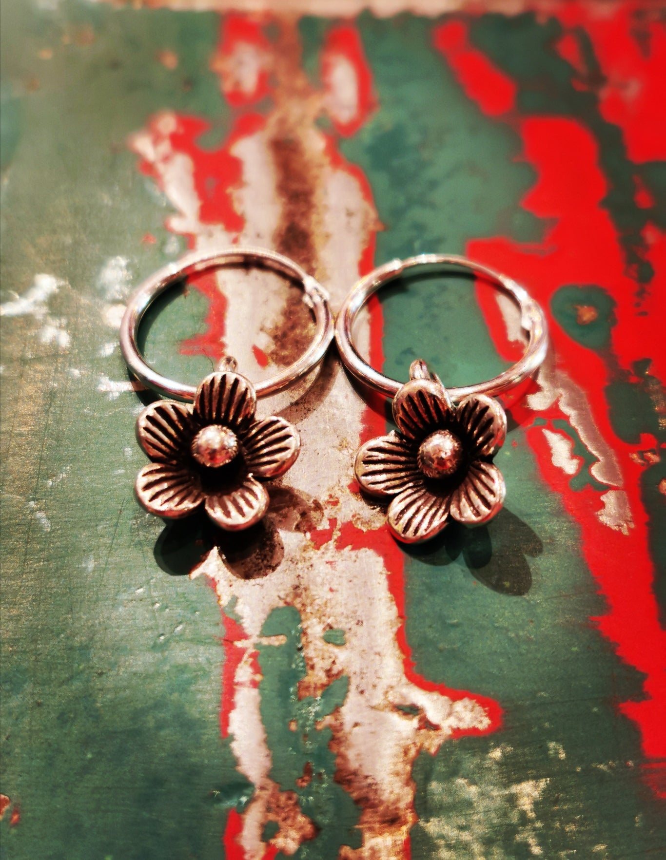 Burmese flora and fauna hoop earrings