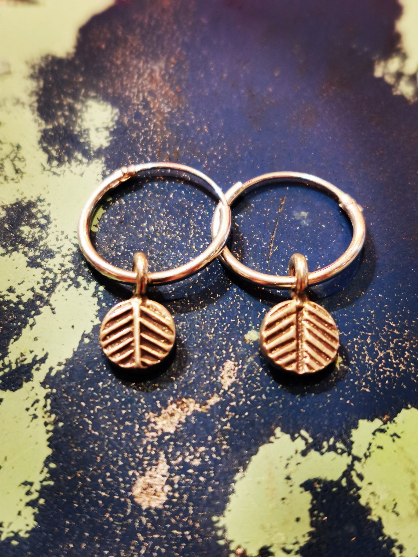 Burmese flora and fauna hoop earrings