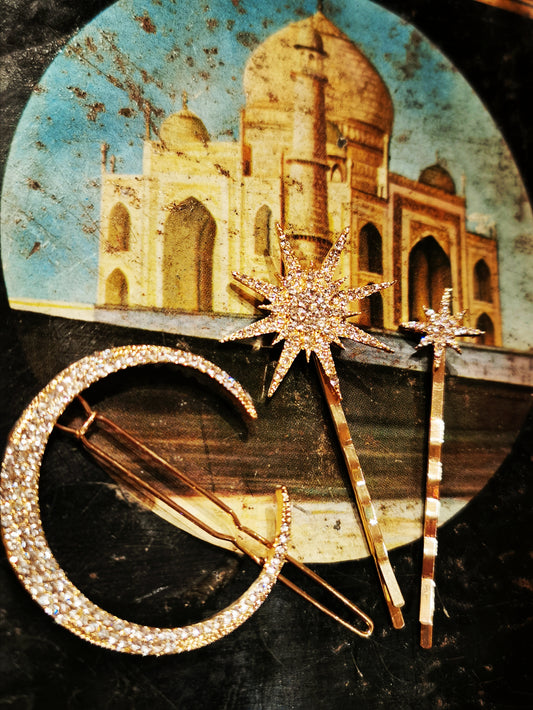 Gorgeous, glamorous vintage style moon and stars hair pins.Comes as a set of 3,wear them all at once for a bit of celestial sparkle!! 