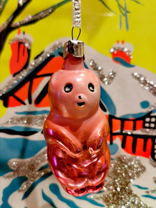 Gorgeous vintage mercury and painted glass peachy coloured pastel bear christmas ornament from the former Soviet Union. Beautifully hand made and decorated. This dates from the 1960s/70s Once you start collecting these it is difficult to stop!!

Made of glass with a steel top and is all original, to be handled and cleaned gently.

Dimensions 9cm high

