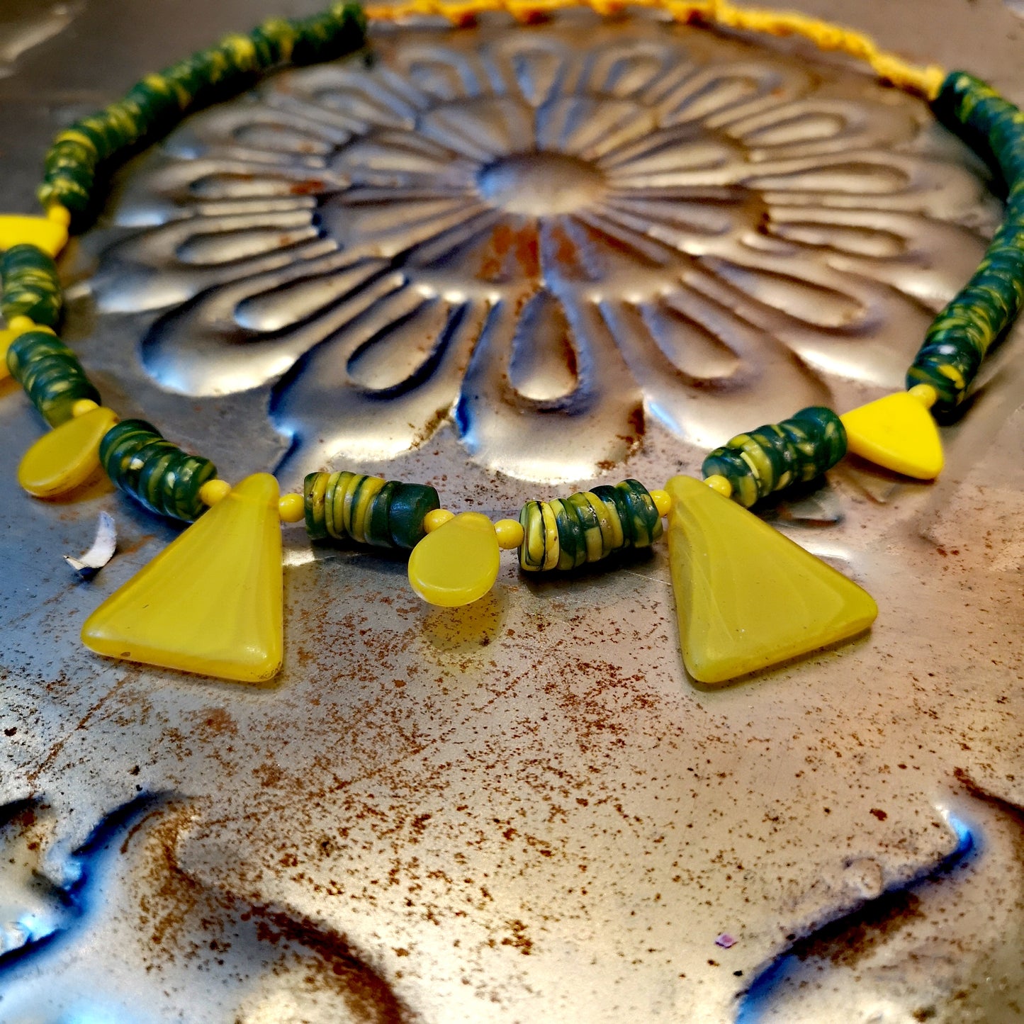 Green and yellow collection of antique and vintage trade beads