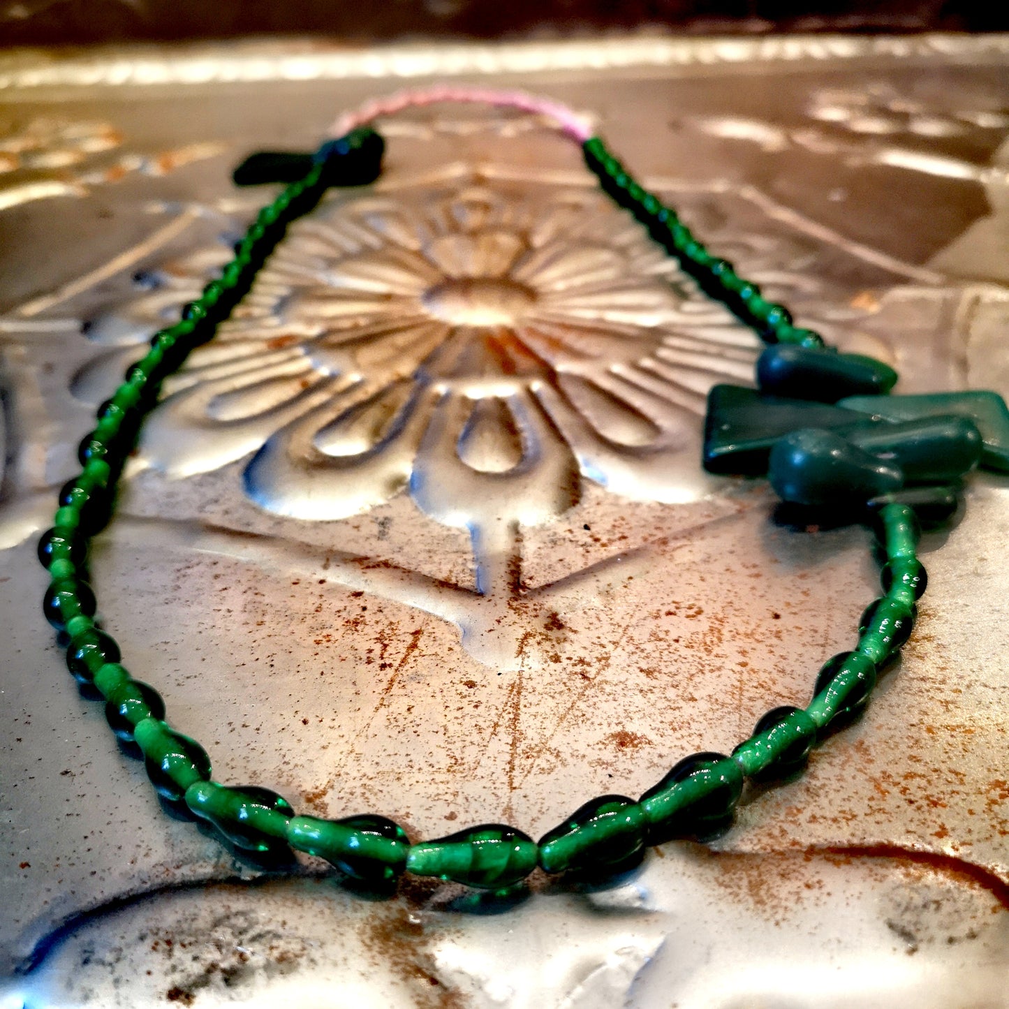 Green and yellow collection of antique and vintage trade beads