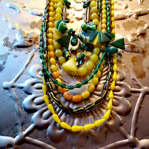 Green and yellow collection of antique and vintage trade beada