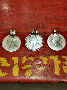Antique Indian silver rupee pendants