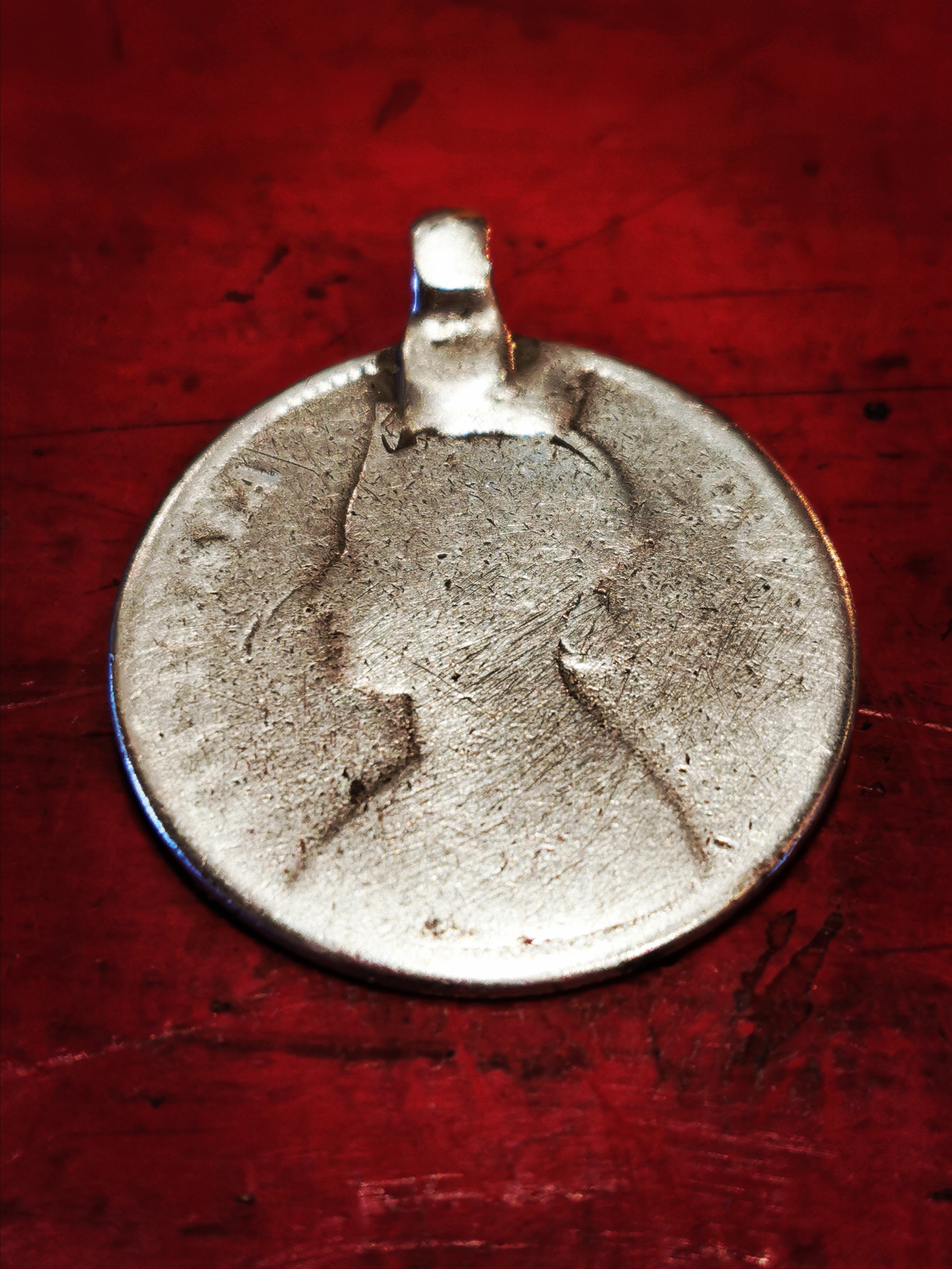 Antique Indian silver rupee pendants