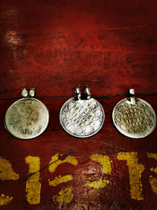 These rupee pendants are of the1880s, as they were such a high grade of silver they were made by local jewellers in Rajasthan into pendants to show how much silver the wearer owned. Beautifully worn with age and lovely pic of the young Empress Victoria just about visible still.

Coins 3cm diameter, loops vary. 



