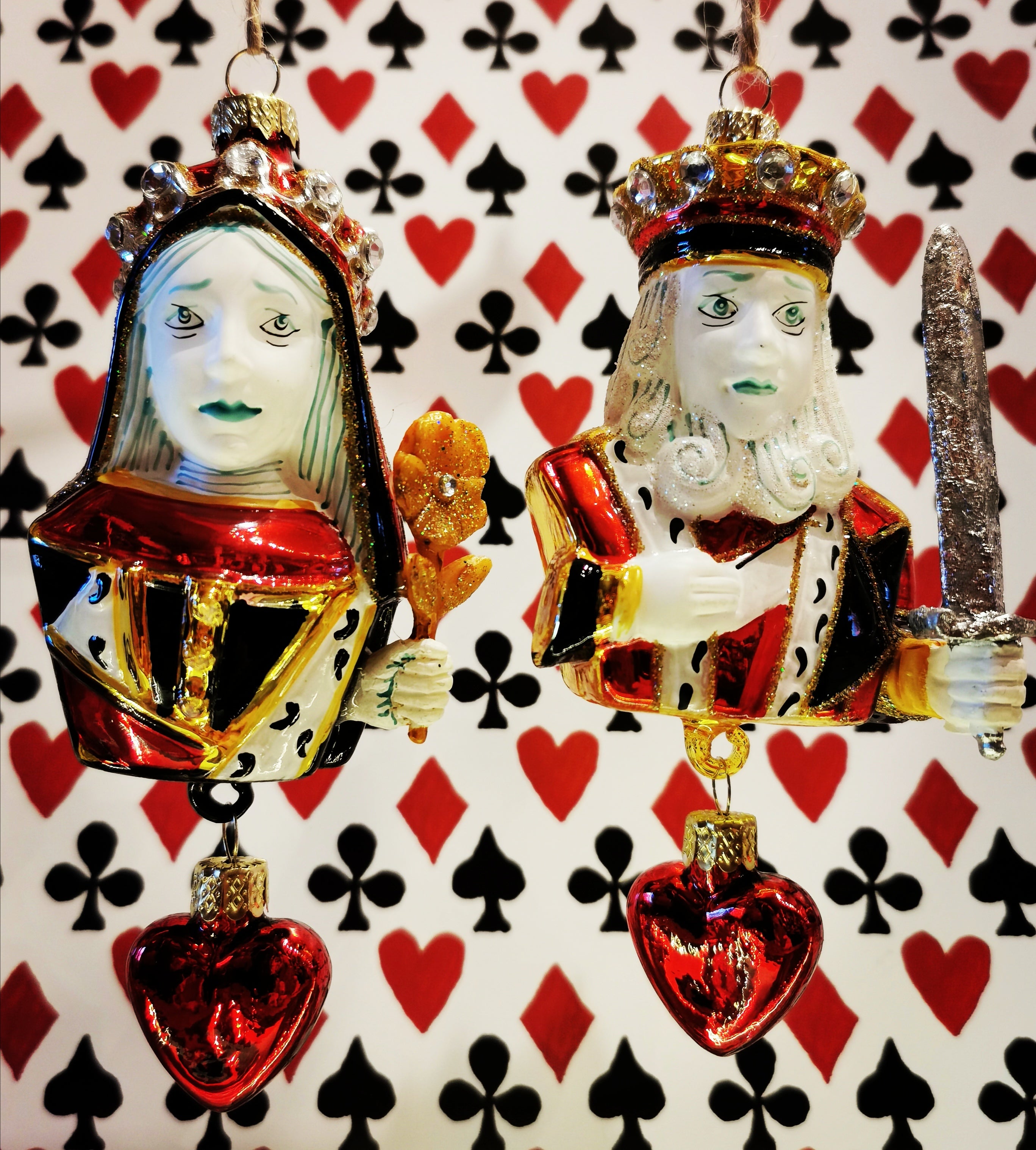 Feel the love with the King and Queen of hearts, gorgeous handpainted, hand decorated playing card inspired glass baubles from America, where these beauties are given as gifts throughout the year.

Approx 13cm high x 7cm x 5cm

