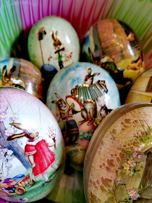 Beautiful German card eggs with vintage Easter illustrations, ready to fill with treats!

Paper and card

18cm x 12cm x 12cm

