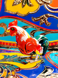 Jumpy clockwork tin rooster for fun! 

Collectable tin toy

8.5cm x 7.5cm x 4cm

Not suitable for children 

