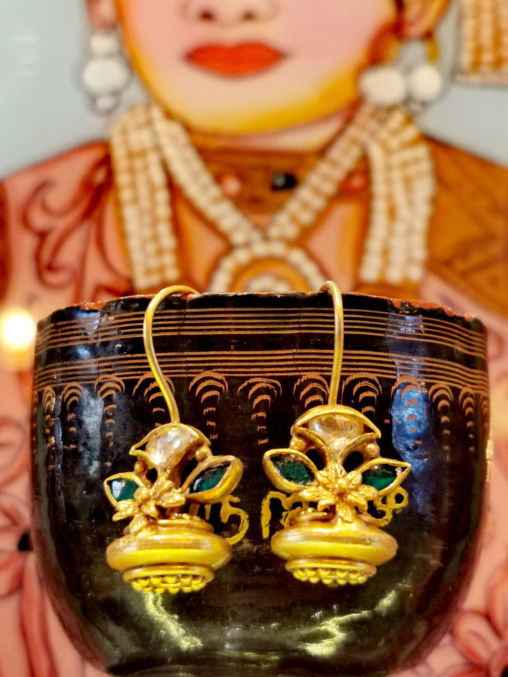 Gorgeous floral chunky drop earrings with emerald green and clear set  crystals. Handmade by skilled jewellers in traditional Rajasthani style.

Gold plated silver, cut crystal. 

