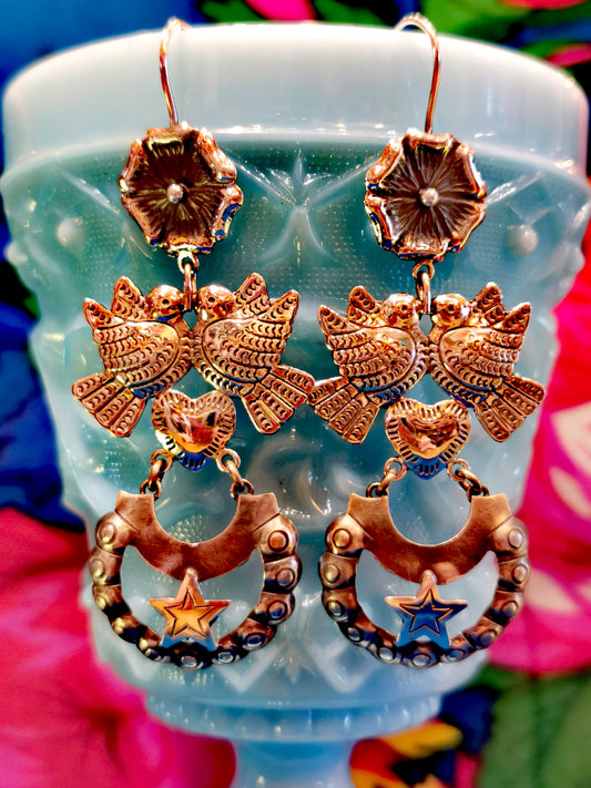 Inspired by Mexican iconography and culture, with a particular emphasis on Frida Kahlo's style, these pieces are just magic!

made in Mexico from sterling silver. 

