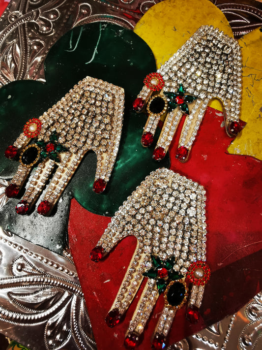 Fabulous darling!, fantastic large, 80s style rhinestone adorned hanging hand brooch.

Leather, rhinestones, brooch back.

11cm x 8cm

