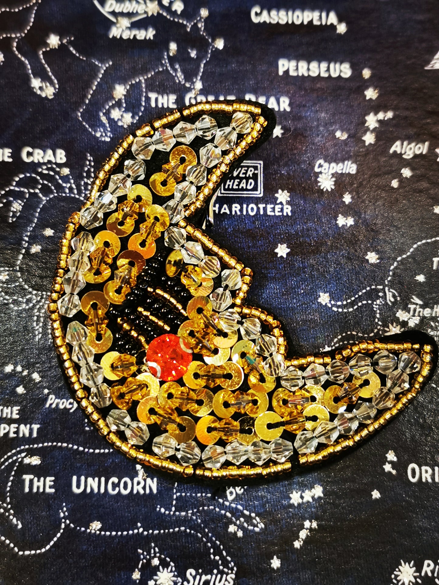 Beaded crescent moon