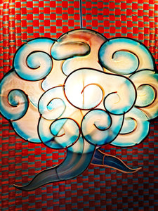 This amazing lantern is made by the kite makers in Vietnam from handpainted silk stretched over a handmade bamboo frame, a thing of great beauty!!. Covering cloud motifs cast a protective spell in South East Asia. Wire hanger in the frame, so can be universally used as a lampshade or just a hanging lantern. 

40 x 41 x 12cm

Silk,bamboo,wire.


