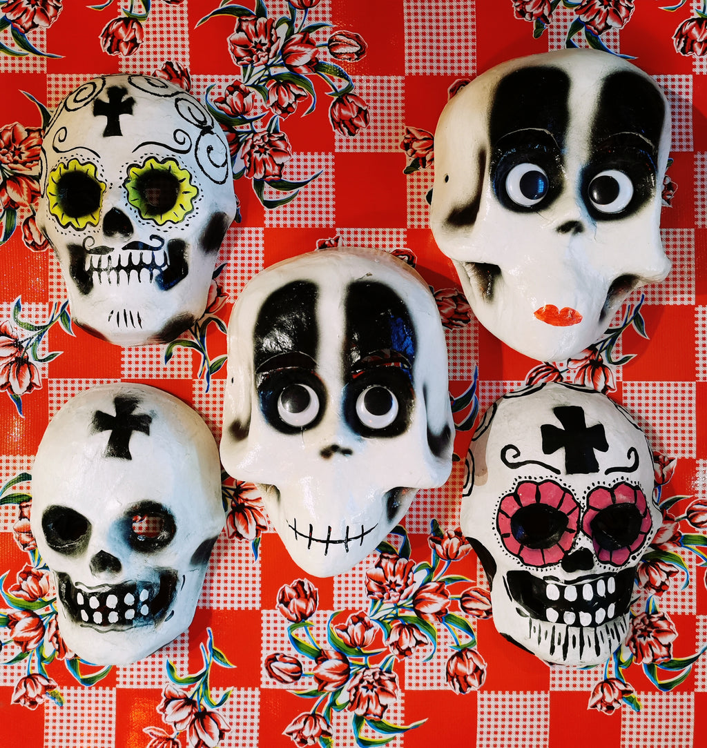 Hand made super-fun paper mache masks made for the Dia dos muertos festival in Oaxaca, Mexico.Folk art is the best!!.

Approx 22cm x 16cm


