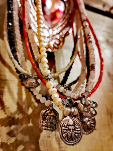 Crystal,coral and antique silver necklaces.