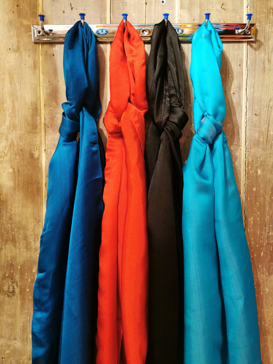 Super luxe silk satin scarves in gorgeous colours woven in Vietnam.Long length, so can be wrapped around the neck twice for warmth. 

45 x 175 cm

Hand wash in silk friendly detergent. 

