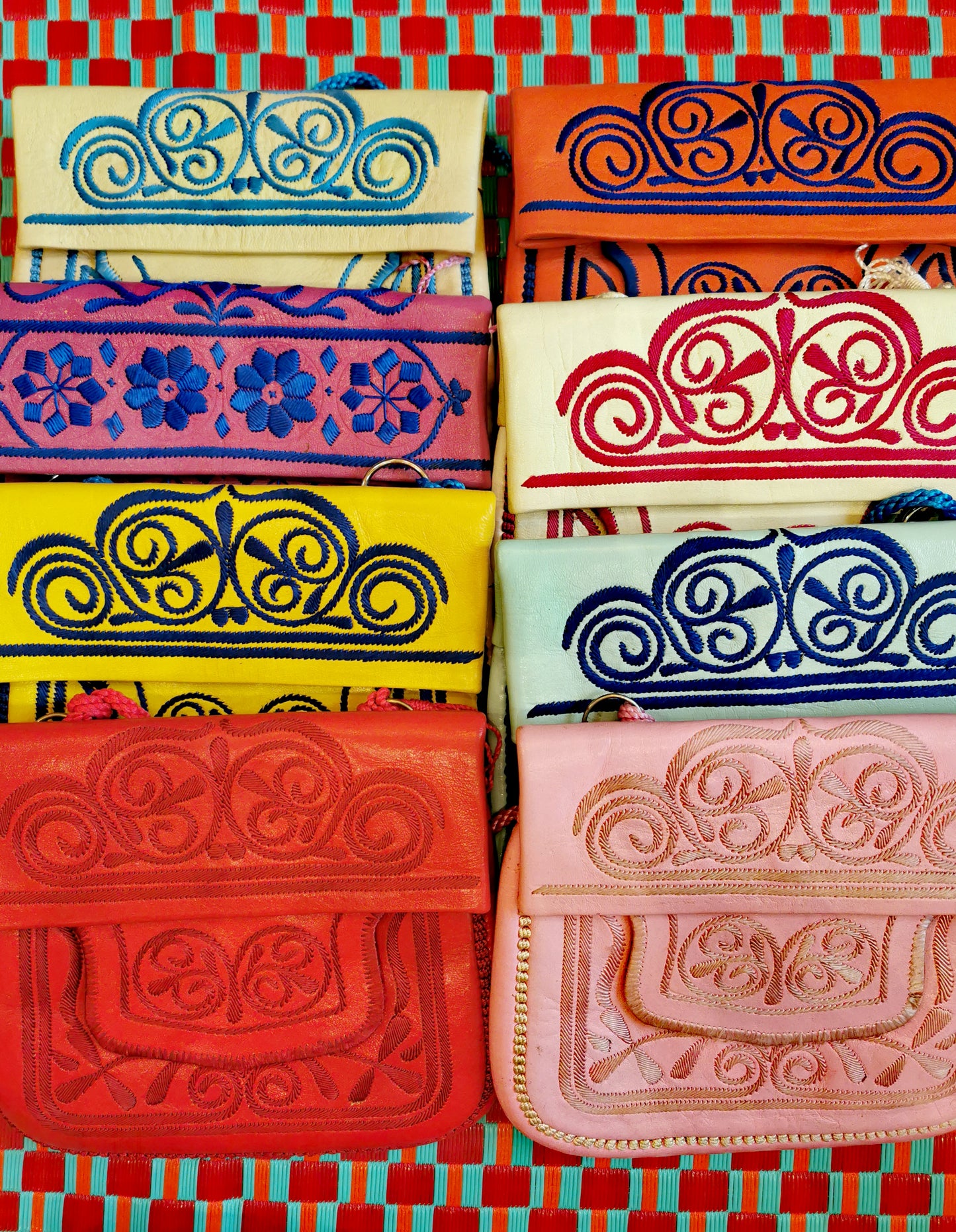 Traditional leather handbags hand embroidered in the Atlas Mountains with gorgeous contrasting  designs. 23 x 20 cm  approx with adjustable cord. 

These are handmade in rural areas and so have slight imperfections. 


Berber bags