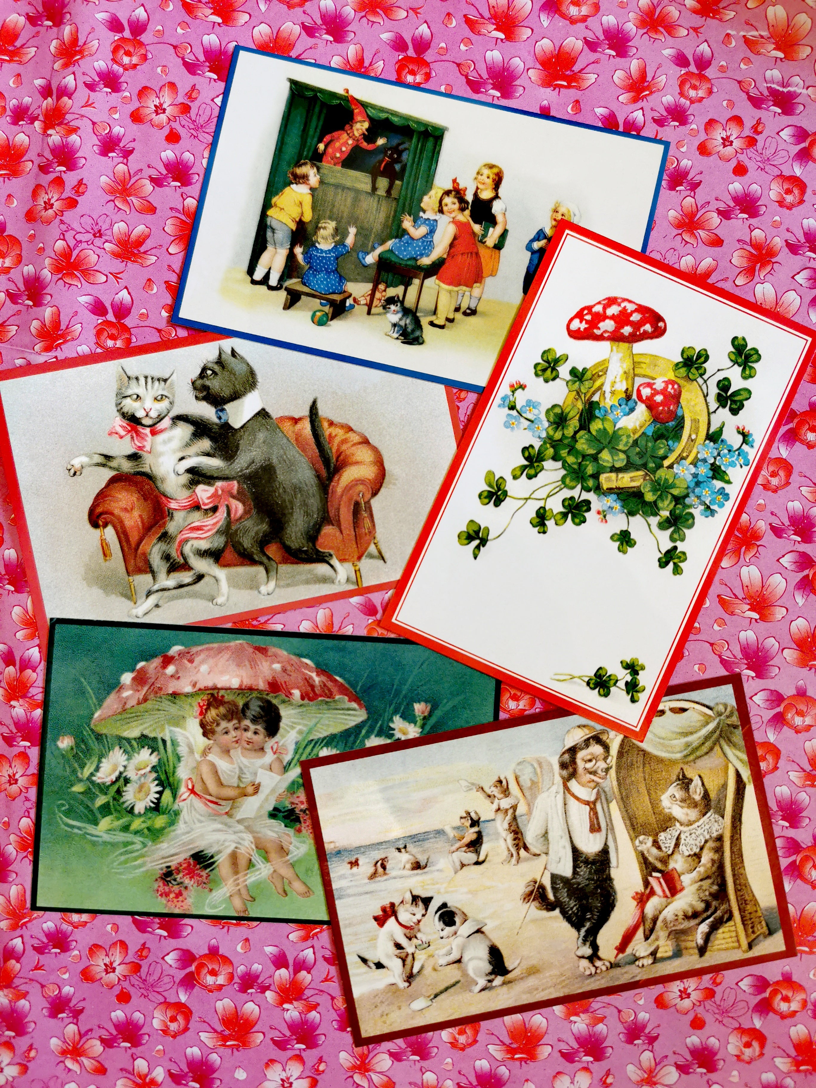 Set of 5 beautifull postcards with images taken from vintage (1910-1930) German illustrations of Punch and Judy, toadstools and cats, all our favourites!! 

Postcards come with envelopes.

 

