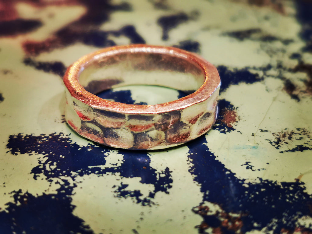 Karen hill tribe silver has a higher content of silver, at 99.5-99.9% compared with sterling silver at 92.5%. This allows the silver to wear and soften differently from standard sterling silver. Many of the Karen ring designs stack together beautifully. All pieces are hand made and hand finished using traditional methods.


 

.

 

