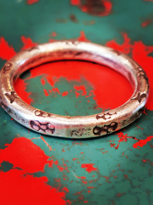 Karen hill tribe silver has a higher content of silver, at 99.5-99.9% compared with sterling silver at 92.5%. This allows the silver to wear and soften differently from standard sterling silver. Many of the Karen ring designs stack together beautifully. All pieces are hand made and hand finished using traditional methods.


 

 

