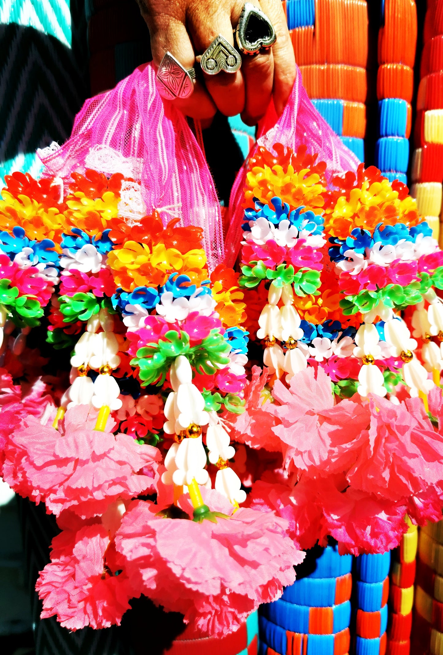Traditionally used to adorn fishing boats, these fabulous kitsch deluxe flower garlands made from plastic cut flowers and hanging soft flowers great draped and sashed en masse for celebrations, are simply to adorn your home, or indeed yourself!

Small double 27cm x 6cm x 2cm

Long 200cm x 4cm x 4cm

Mini circles 27cm (inc. ribbon) x 6cm x 2cm

