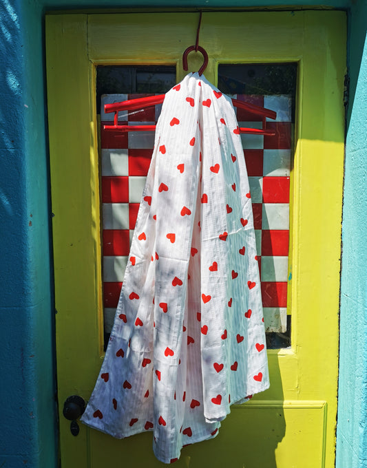 These beautiful large fine cotton seersucker shawls are printed with gorgeous and super-kitsch red hearts.Big enough to throw around your shoulders, or to wear as a sarong and fine enough to wear as a scarf.

Washable at 30 degrees,dry naturally.

approx 170 x 150cm

Cotton.

 

