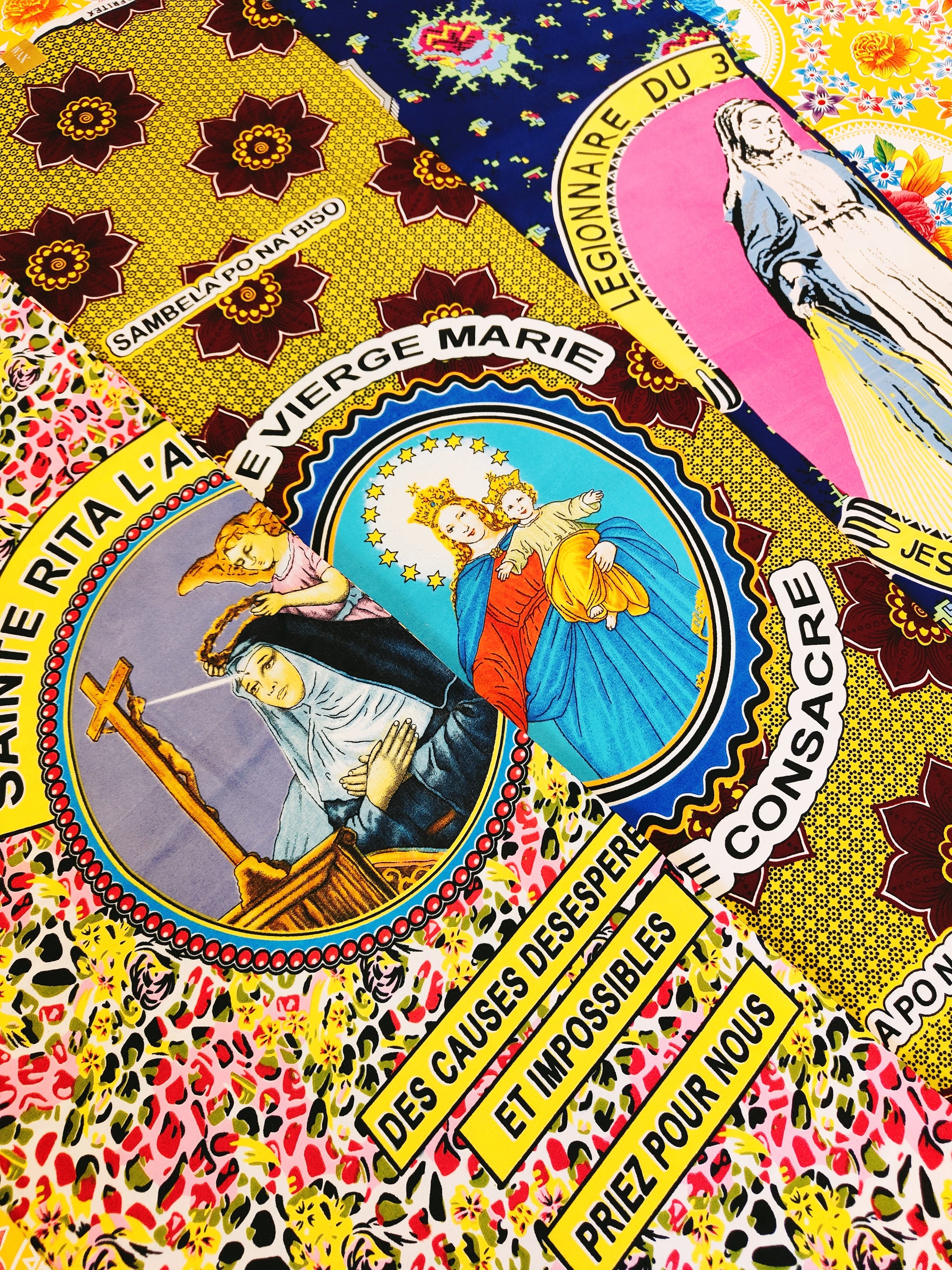6 whole yards of rare African wax cotton fabric adorned with Catholic Saints for special days and holidays.These gorgeous cloths are from the Congo and Ivory Coast and are REALLY hard to get hold of!

Adorn your Christmas table, or make beautiful dresses, cushions or curtains from them.

112cm x 550cm

Designs change through the cloth and repeat.


