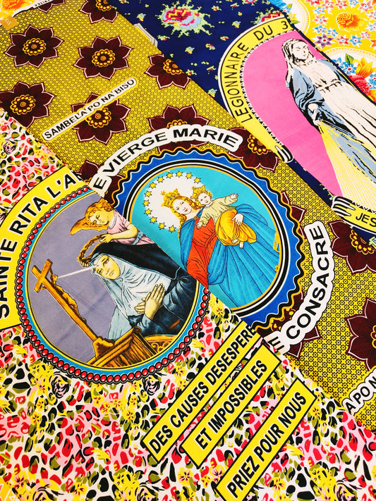 6 whole yards of rare African wax cotton fabric adorned with Catholic Saints for special days and holidays.These gorgeous cloths are from the Congo and Ivory Coast and are REALLY hard to get hold of!

Adorn your Christmas table, or make beautiful dresses, cushions or curtains from them.

112cm x 550cm

Designs change through the cloth and repeat.

