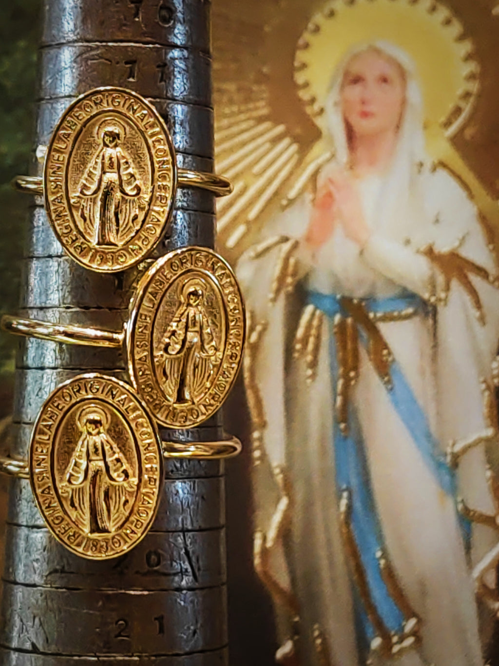 These gorgeous Virgin Mary rings are worn to help shield from harm,,made in silver then coated in lashings of bold gold!

Plated rings must be treated with care, to keep the plate rich for as long as possible remove when washing, applying creams, using detergents etc. 

