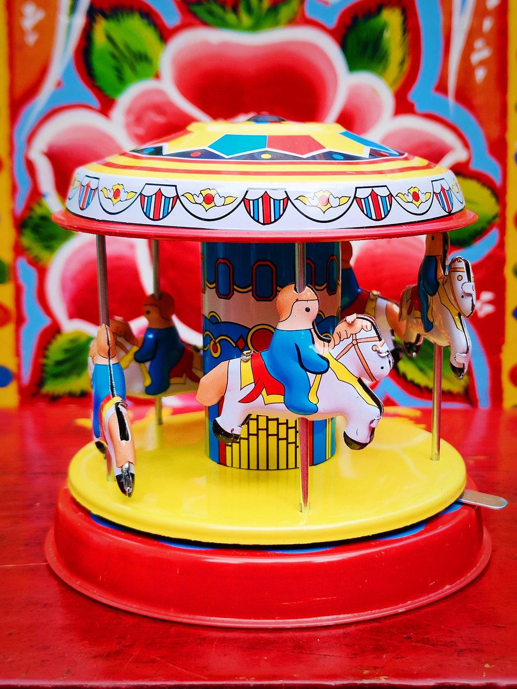 Spinning carousel tin toy,all the love combined, nostalgia, seaside carousel, fairgrounds and tin toys!

10 x 11 x 10cm

Not suitable as children's toy

