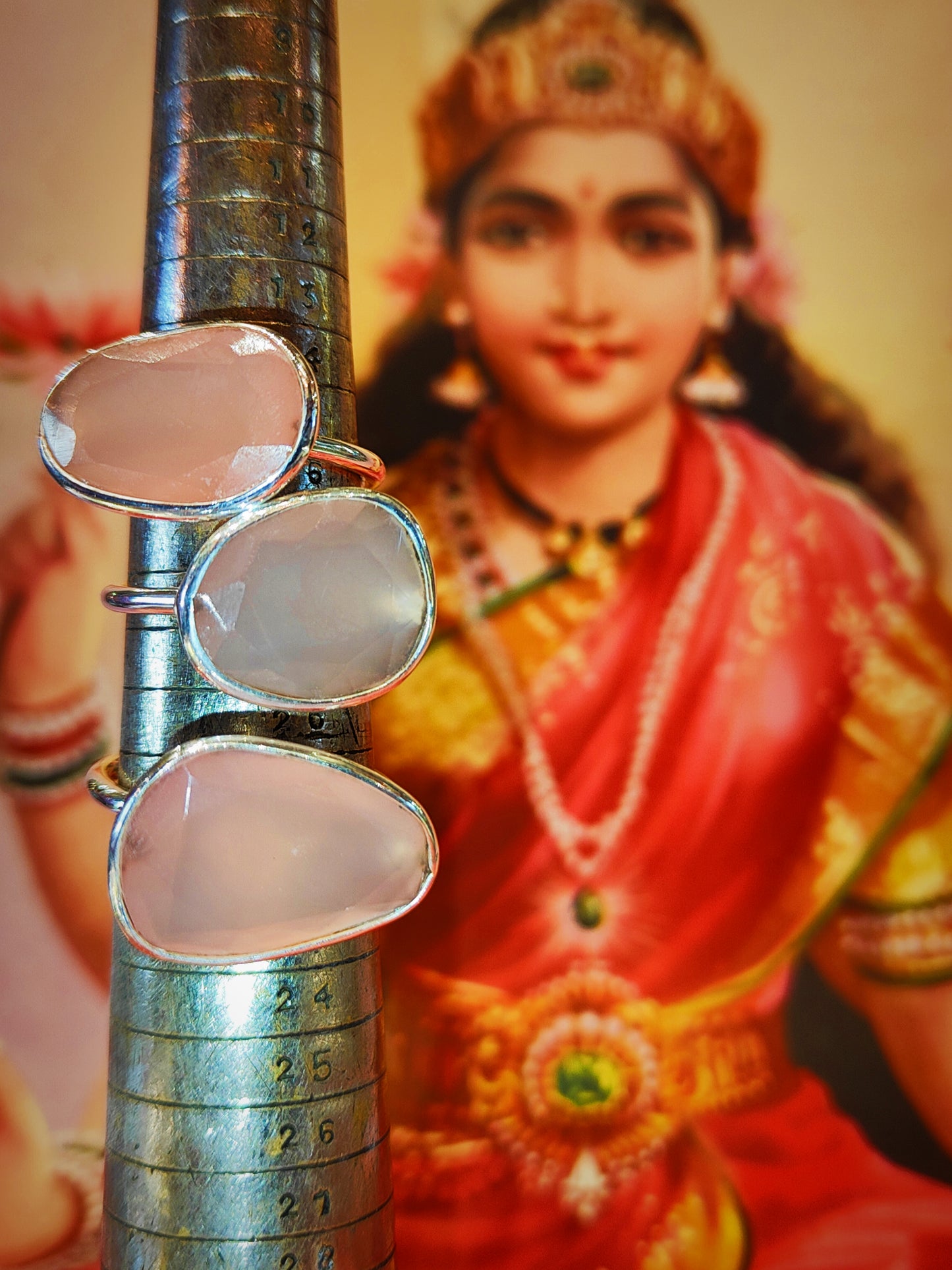 Rough cut faceted rose quartz. This semi precious stone has soft pink tone. We source stones directly, choosing every one to be made into rings in India, such a juicy job!

These are made by hand from silver,and sit high on the hand so stack well with plain bands.

