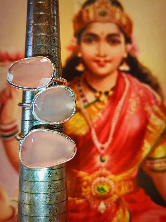 Rough cut faceted rose quartz. This semi precious stone has soft pink tone. We source stones directly, choosing every one to be made into rings in India, such a juicy job!

These are made by hand from silver,and sit high on the hand so stack well with plain bands.

