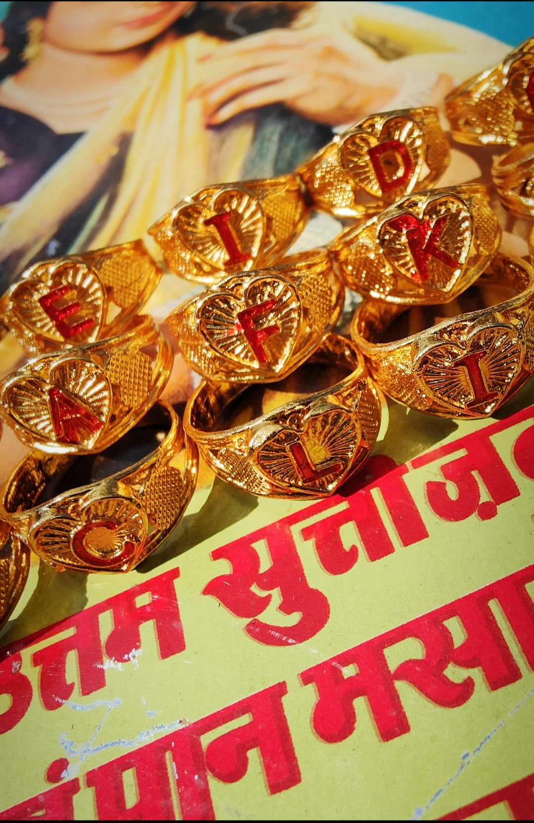 Utterly fabulous super-kitsch Indian initial rings,all are around a size P ,kind of thumb or middle finger size,but we end up wrapping a bit of coloured string around the back of we want them smaller!!

Gold plated metal

