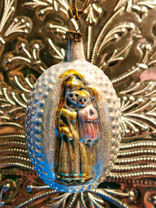 Traditional hand blown, painted glass decoration from Lauscha Germany.  This German mouth blown and lovingly hand painted Mary and Jesus decoration will bring some Christmas splendor to your house and tree.  Size 6 x 7 cm  Fragile, handle with care